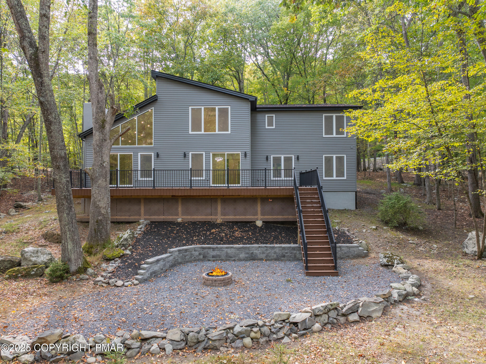 5806 Decker Road Bushkill, PA 18324 - Photo 62 of 76 a view of a house with backyard and a tree
