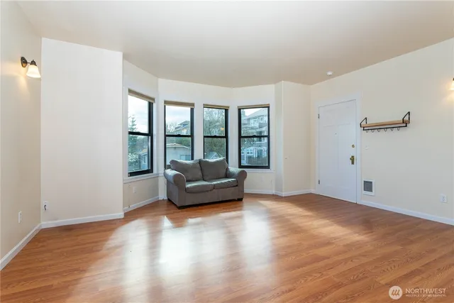 a view of livingroom with furniture and windows