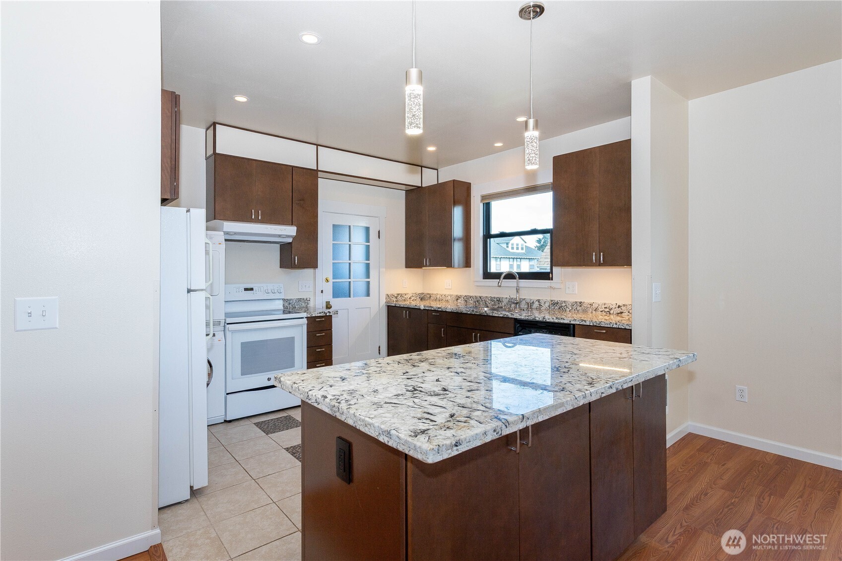 3010 East Spruce Street Seattle, WA 98122 - Photo 8 of 20 a kitchen with cabinets and counter space
