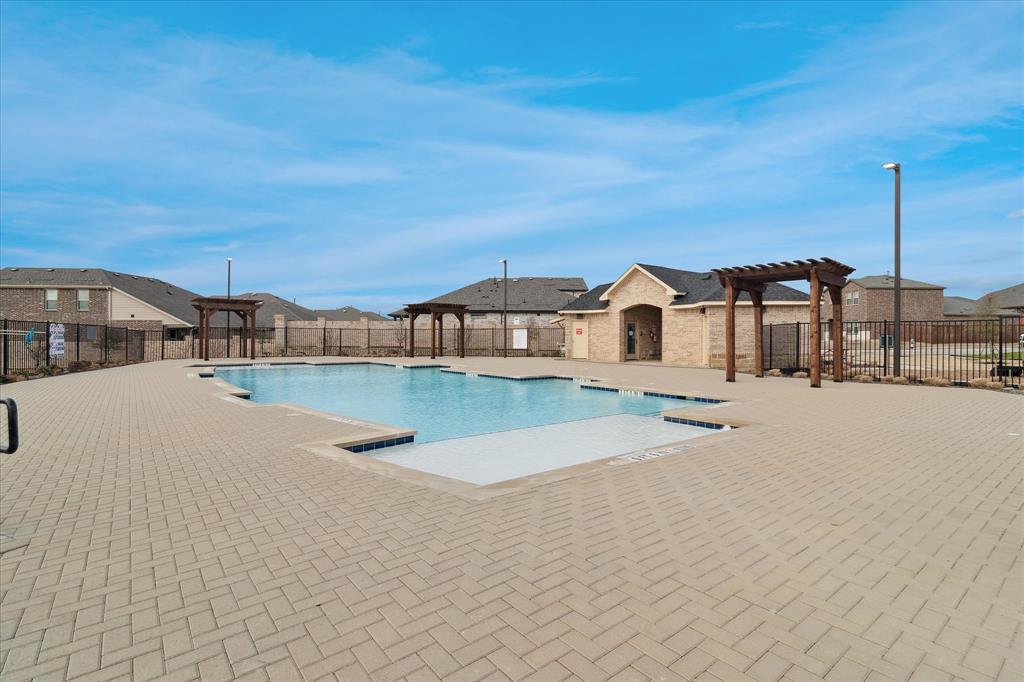 1132 Rountree Court Celina, TX 75009 - Photo 26 of 27 Come make this your dream home just in time to enjoy your summer at the neighborhood pool!