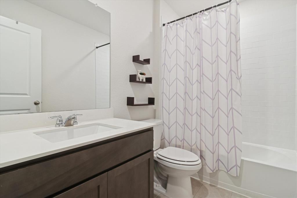 1132 Rountree Court Celina, TX 75009 - Photo 5 of 27 One of 3 (very clean) full baths this unique floorpan has to offer.