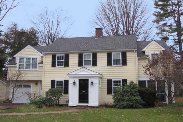 8 Windemere Road Wellesley, MA 02481 - Photo 1 of 20 a front view of a house with garden