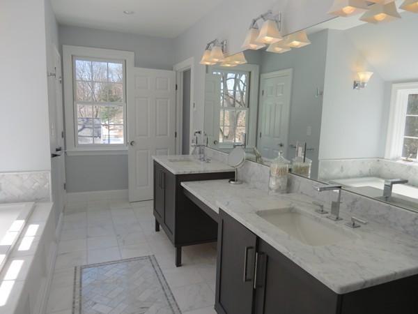 8 Windemere Road Wellesley, MA 02481 - Photo 17 of 20 a bathroom with a sink double vanity and a mirror