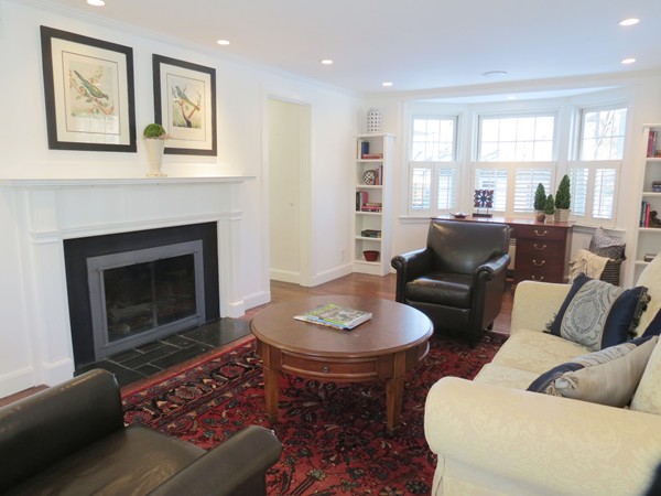 8 Windemere Road Wellesley, MA 02481 - Photo 5 of 20 a living room with furniture a fireplace and a large window
