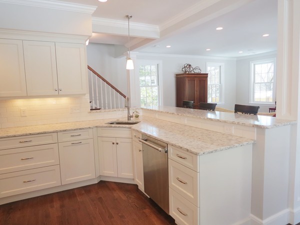 8 Windemere Road Wellesley, MA 02481 - Photo 10 of 20 a kitchen with granite countertop white cabinets and white appliances
