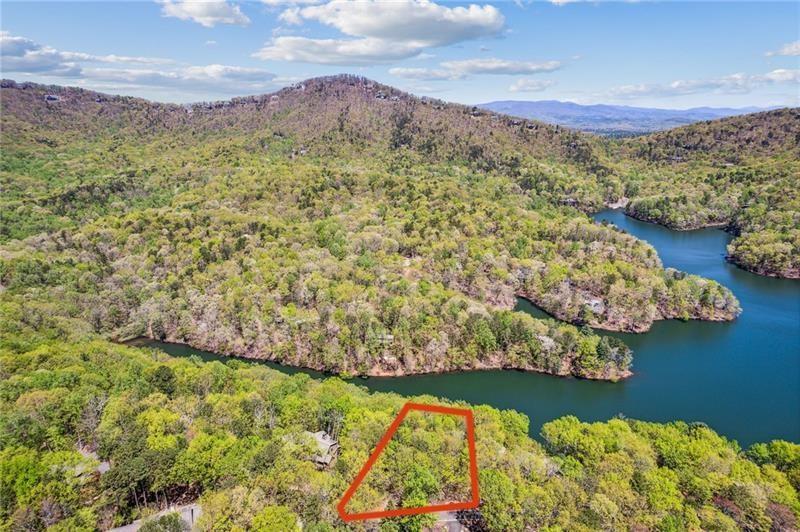 1150 Swallow Point Big Canoe, GA 30143 - Photo 8 of 26 a view of a lake with a mountain in the background