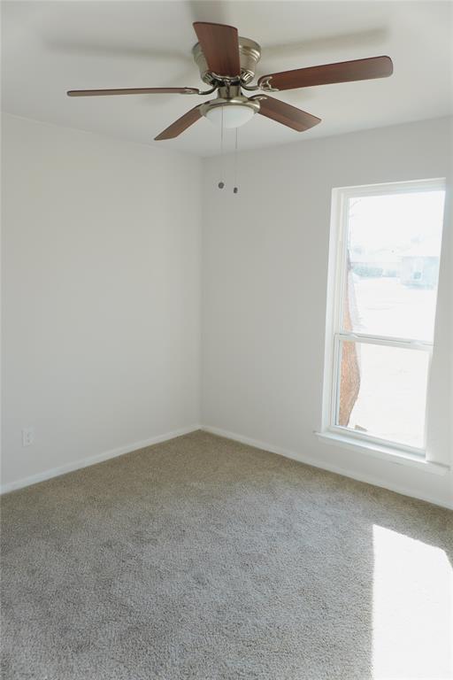 6357 Cascade Circle Watauga, TX 76148 - Photo 16 of 22 a view of an empty room with a window