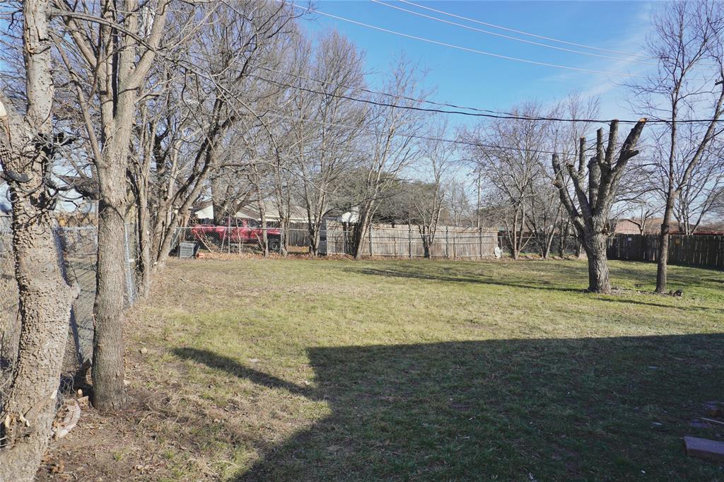 6357 Cascade Circle Watauga, TX 76148 - Photo 18 of 22 a view of a yard with a house