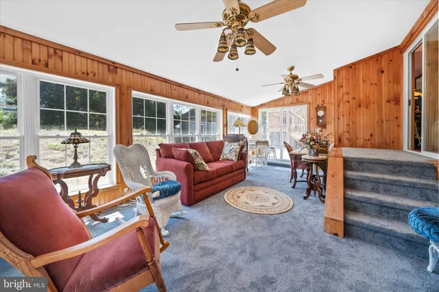 a very nice looking living room with a large window