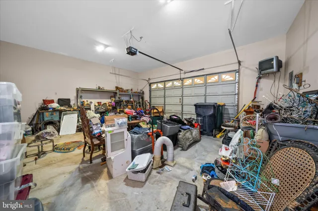 a bathroom with a sink mirror and toilet