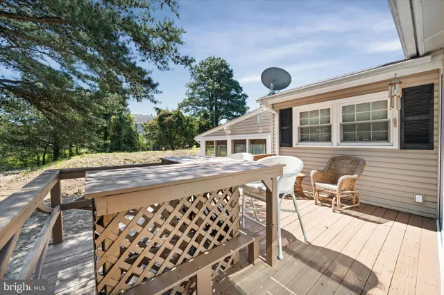 an aerial view of a house with a yard and garden