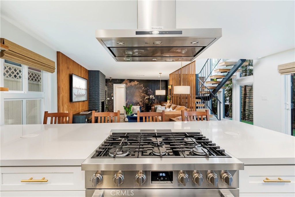 35 Geneva Walk Long Beach, CA 90803 - Photo 17 of 36 a kitchen with a stove and white cabinets