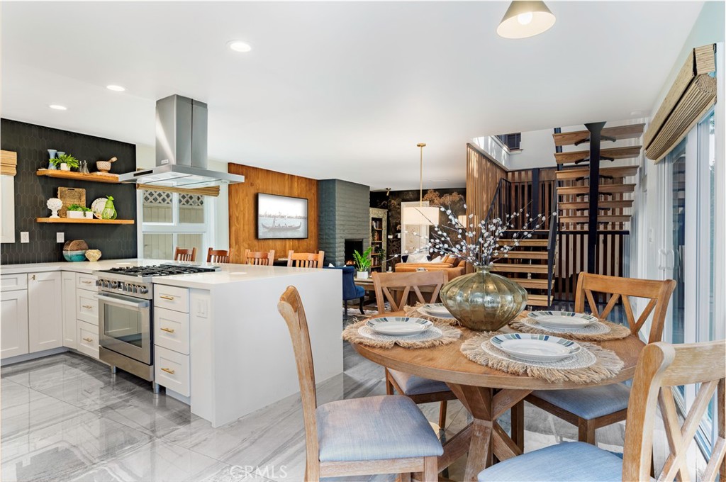 35 Geneva Walk Long Beach, CA 90803 - Photo 18 of 36 a view of a dining room with furniture and a kitchen