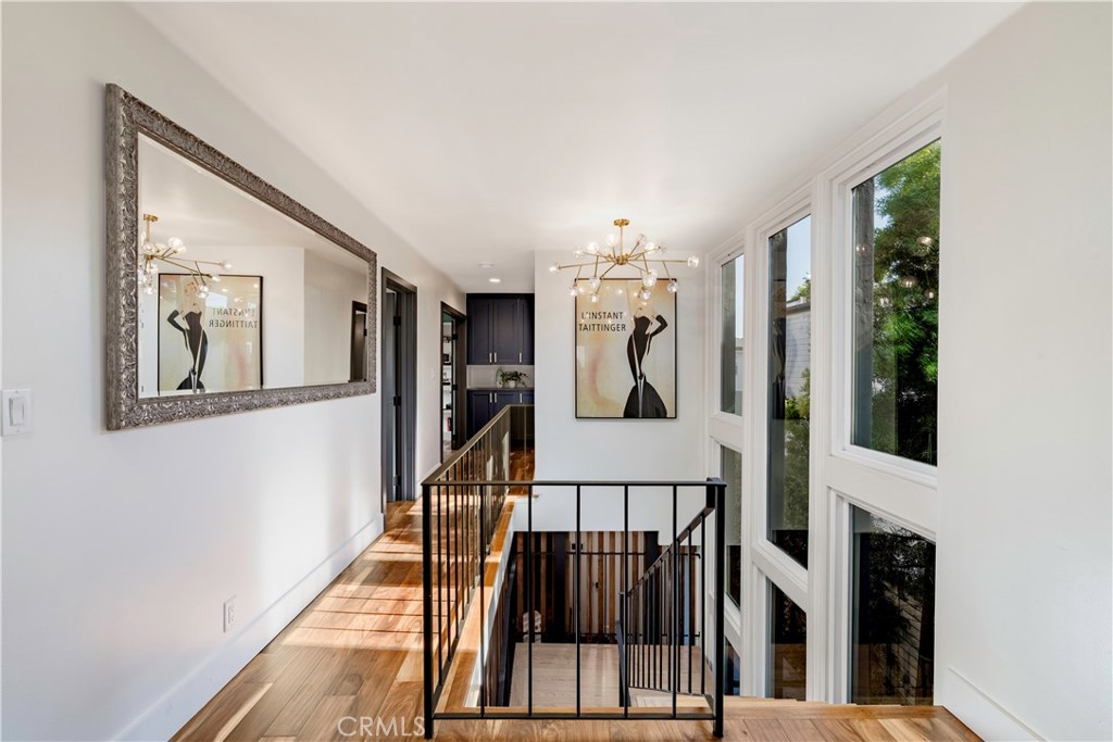 35 Geneva Walk Long Beach, CA 90803 - Photo 22 of 36 a view of entryway and hall with wooden floor