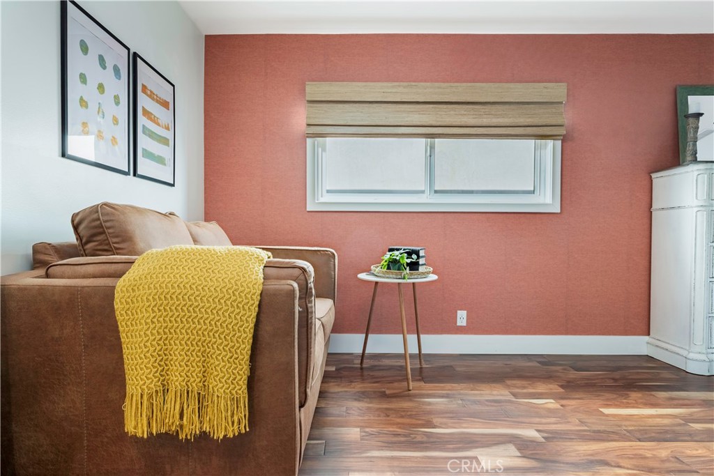 35 Geneva Walk Long Beach, CA 90803 - Photo 29 of 36 a bedroom with a bed and wooden floor