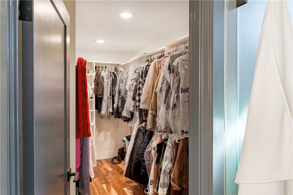 35 Geneva Walk Long Beach, CA 90803 - Photo 36 of 36 a view of walk in closet with clothes