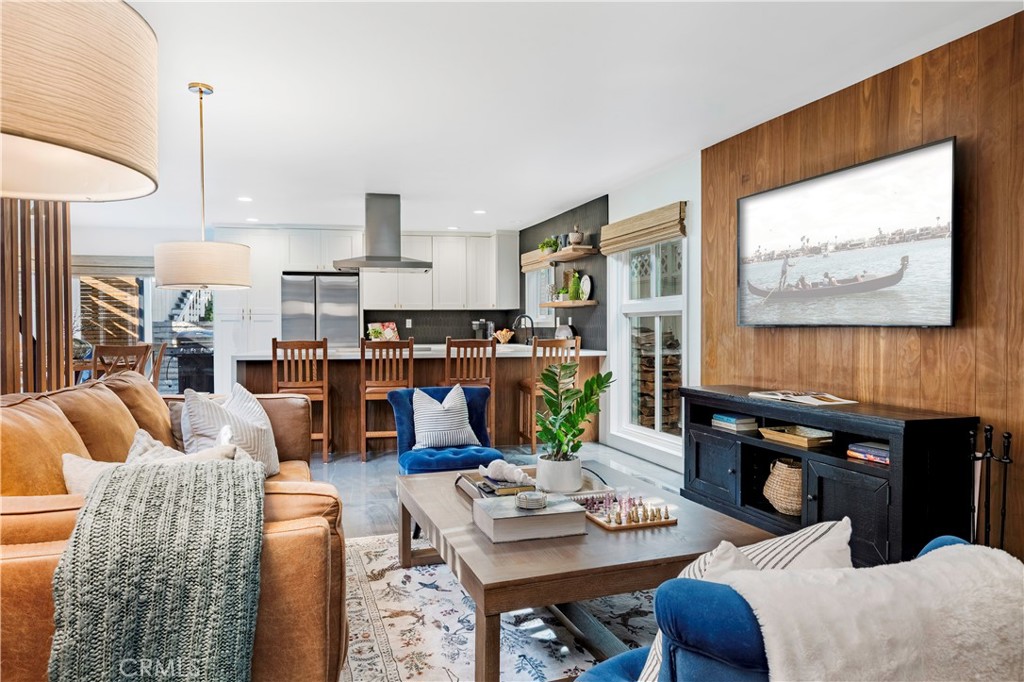 35 Geneva Walk Long Beach, CA 90803 - Photo 7 of 36 a living room with furniture and a flat screen tv