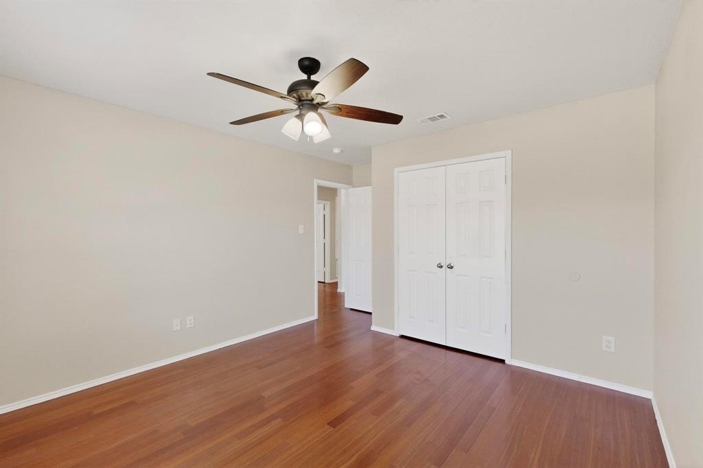 303 Laurel Lane Fate, TX 75087 - Photo 25 of 33 a view of an empty room and wooden floor