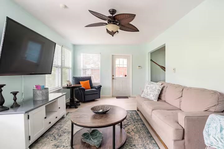 238 Lily Road St. Augustine Shores, FL 32086 - Photo 11 of 22 a living room with furniture and a flat screen tv