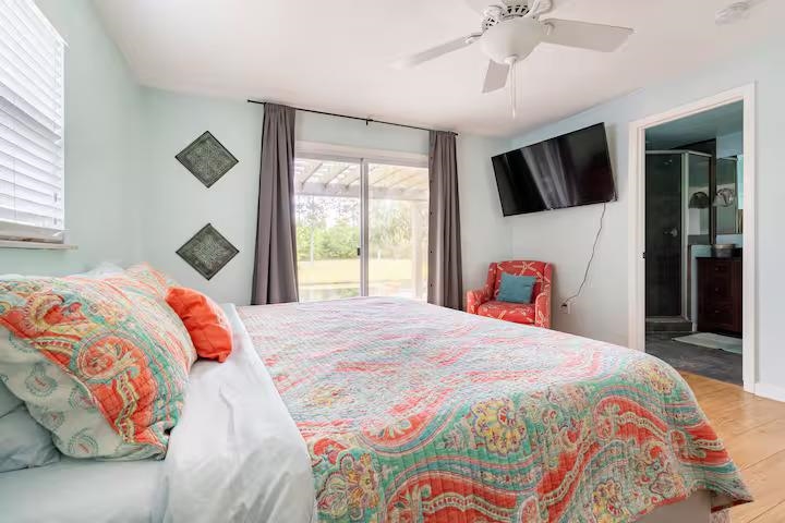 238 Lily Road St. Augustine Shores, FL 32086 - Photo 15 of 22 a bedroom with a large bed and a window