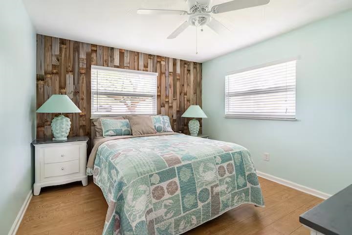 238 Lily Road St. Augustine Shores, FL 32086 - Photo 18 of 22 a bedroom with a bed and a window