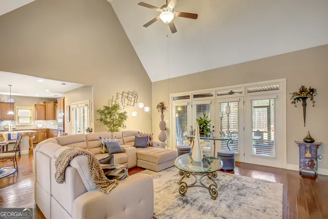 a kitchen with stainless steel appliances granite countertop a refrigerator sink and cabinets