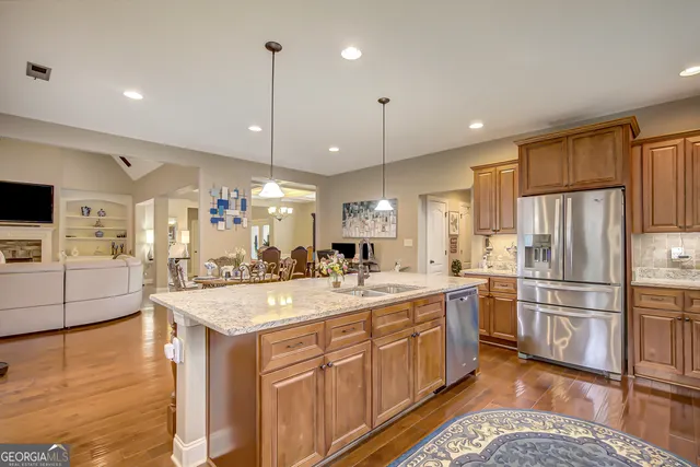 a spacious bathroom with a sink mirror and shower