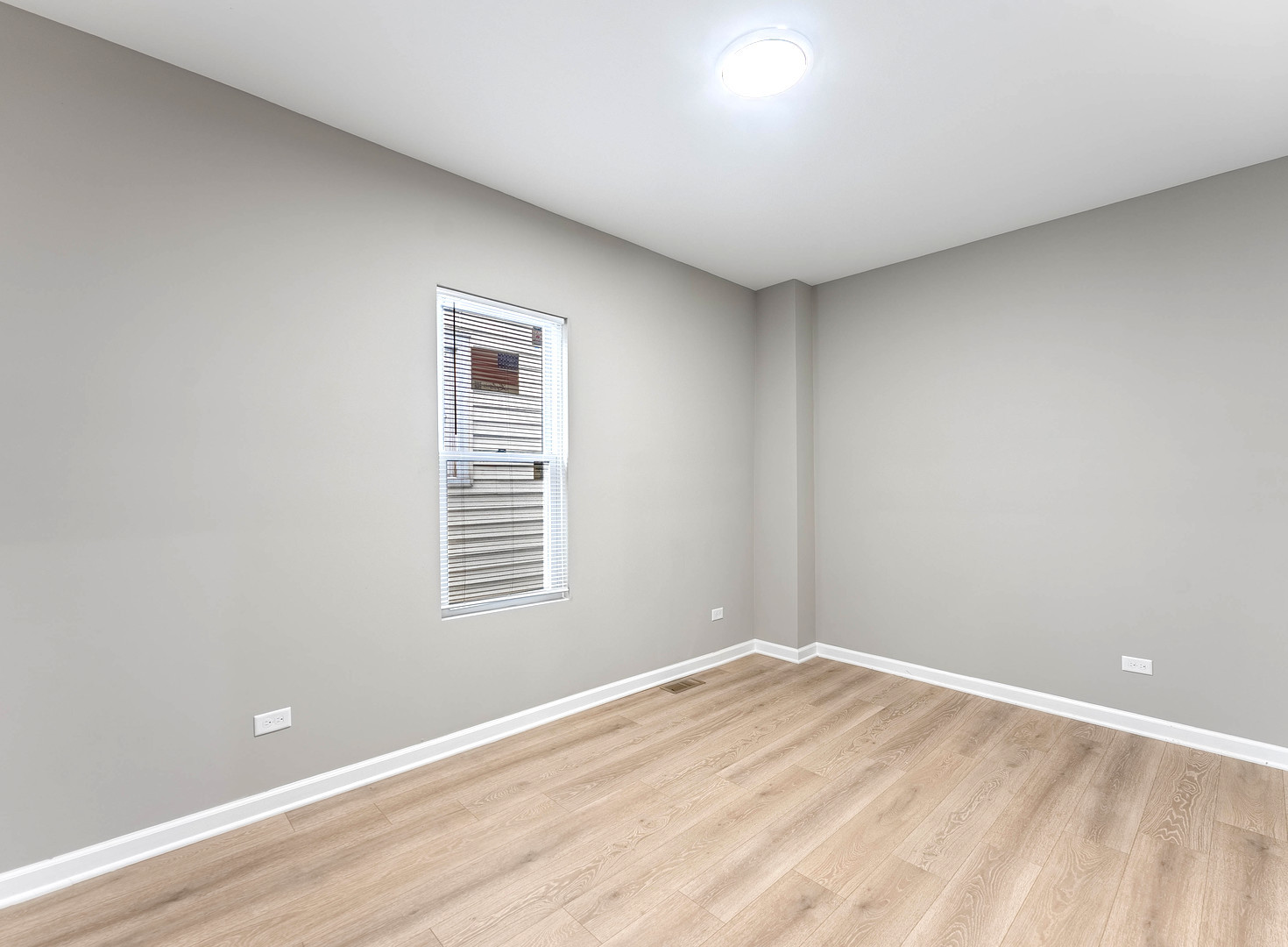 2733 West 38th Street Chicago, IL 60632 - Photo 16 of 30 a view of empty room with wooden floor and fan