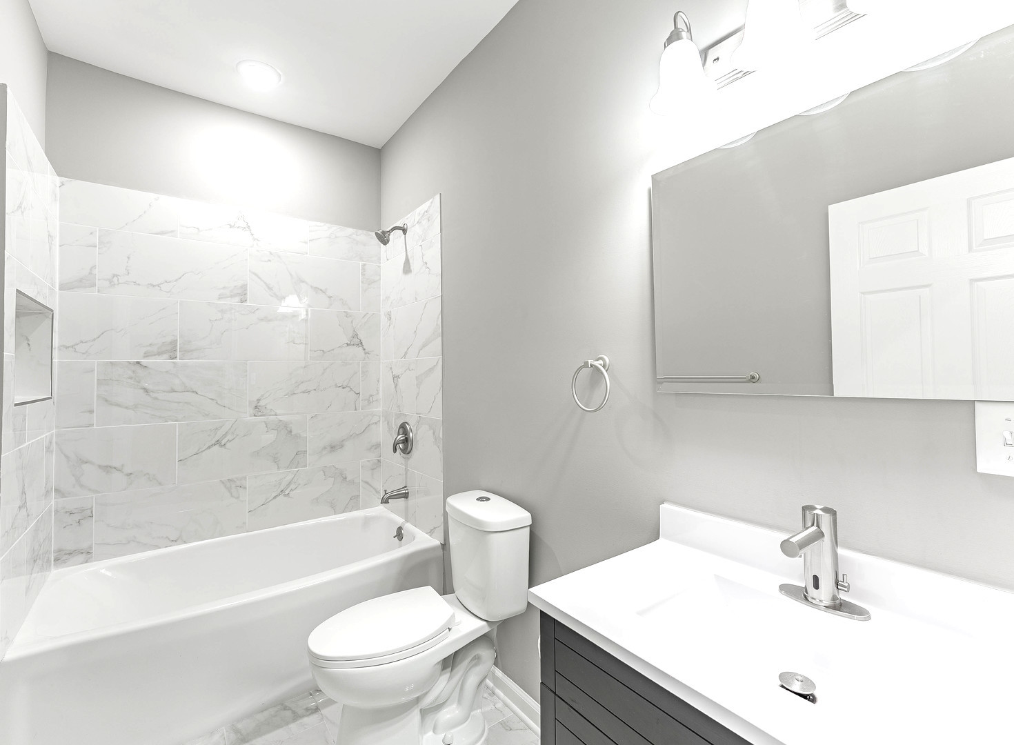 2733 West 38th Street Chicago, IL 60632 - Photo 17 of 30 a bathroom with a sink a toilet and a bathtub