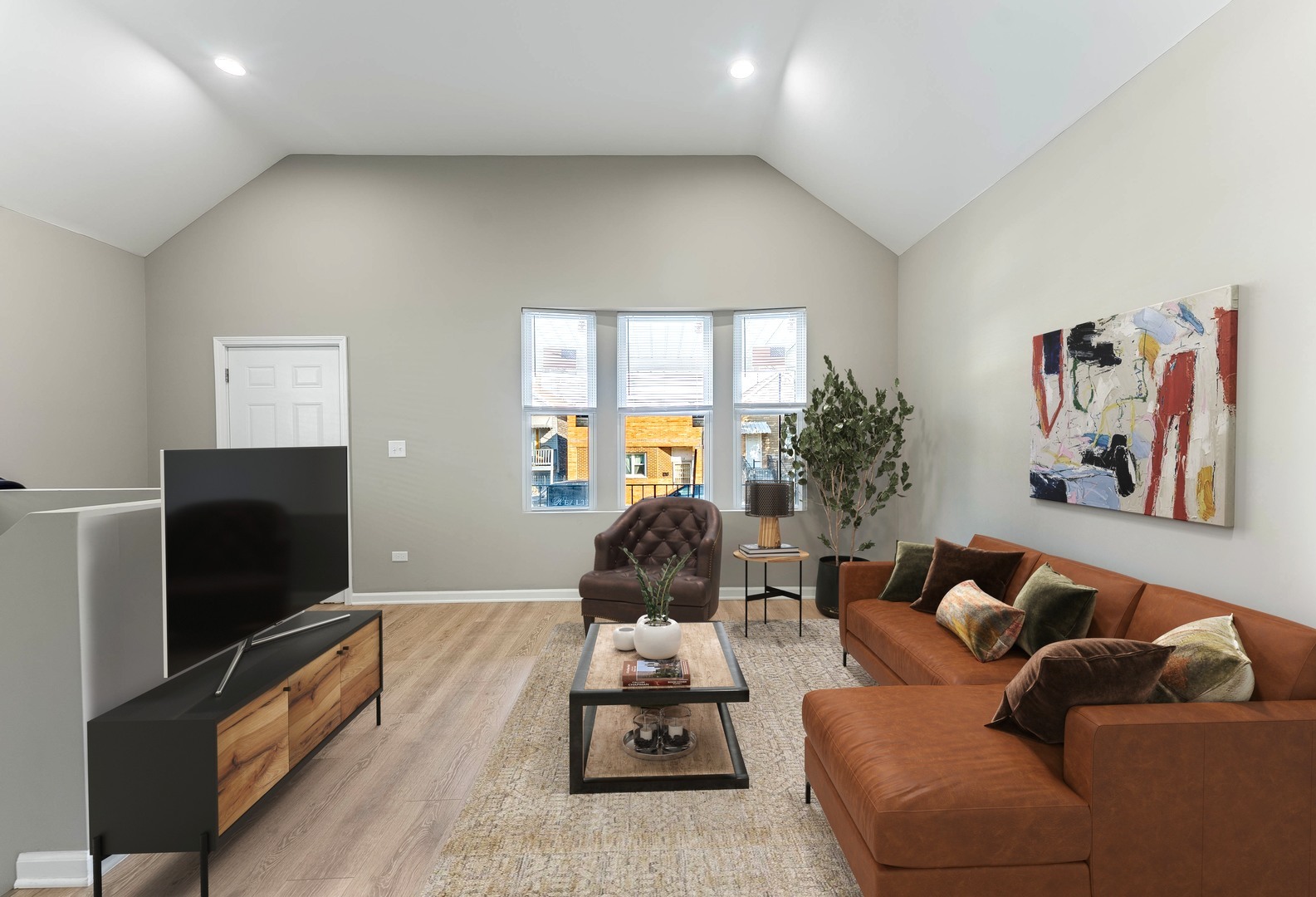 2733 West 38th Street Chicago, IL 60632 - Photo 3 of 30 a living room with furniture and a flat screen tv