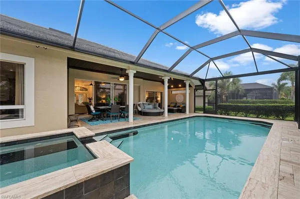 a view of a swimming pool with a porch