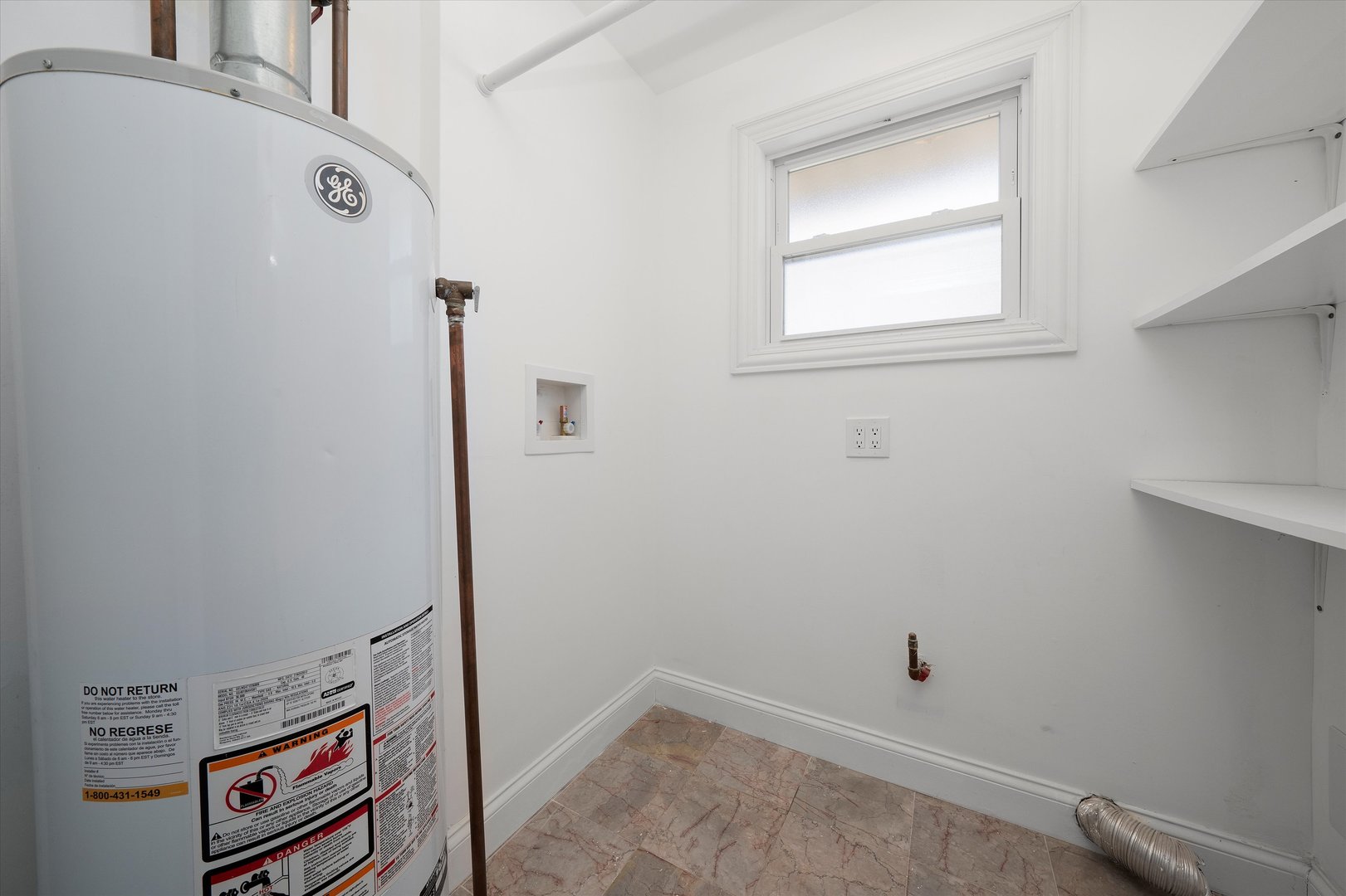 7918 74th Street Bridgeview, IL 60455 - Photo 15 of 26 a view of a room with rack on the wall