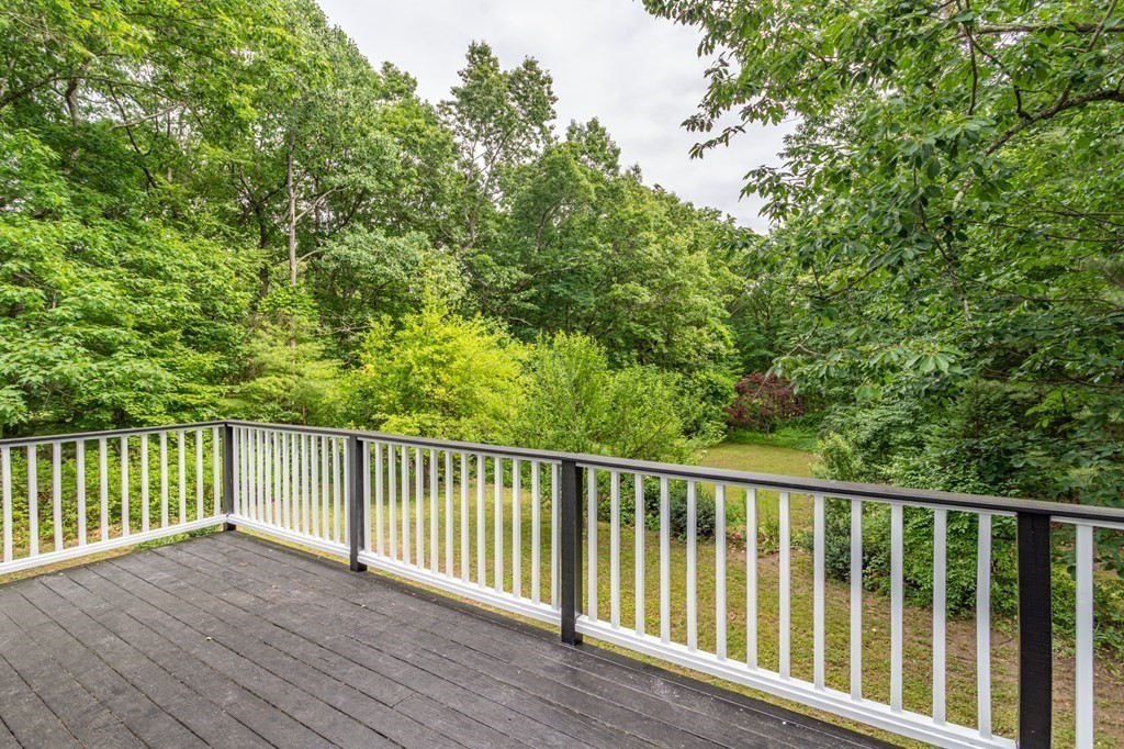 85 Kaleva Road Lancaster, MA 01523 - Photo 11 of 15 a view of balcony with wooden floor