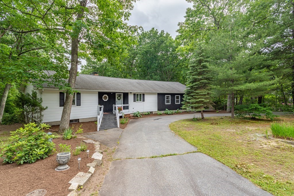85 Kaleva Road Lancaster, MA 01523 - Photo 13 of 15 a front view of a house with garden