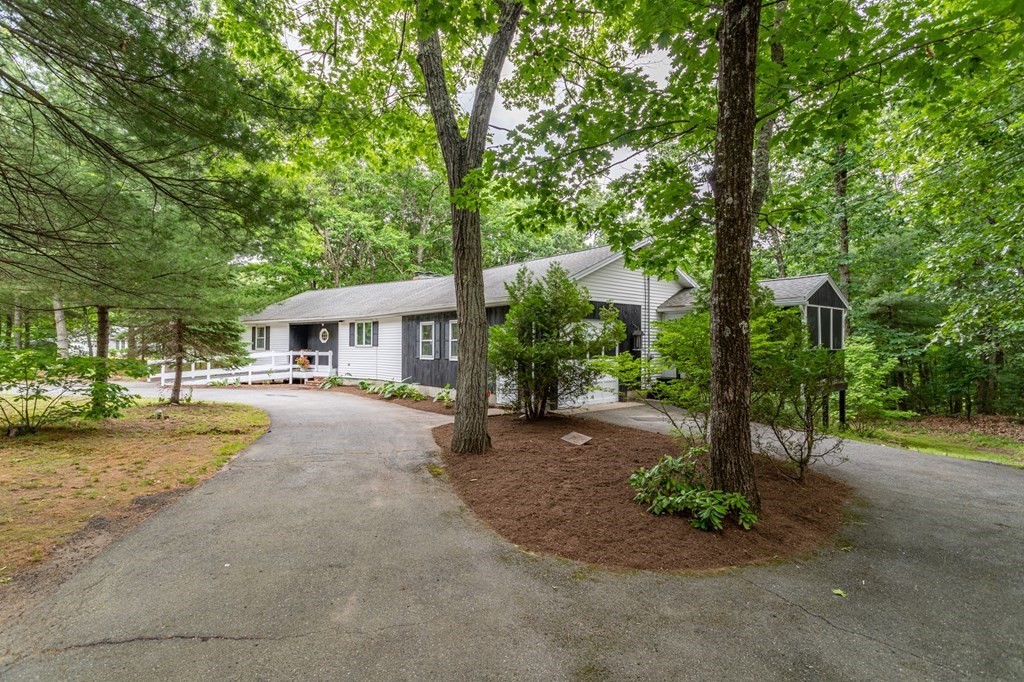 85 Kaleva Road Lancaster, MA 01523 - Photo 15 of 15 a front view of a house with garden