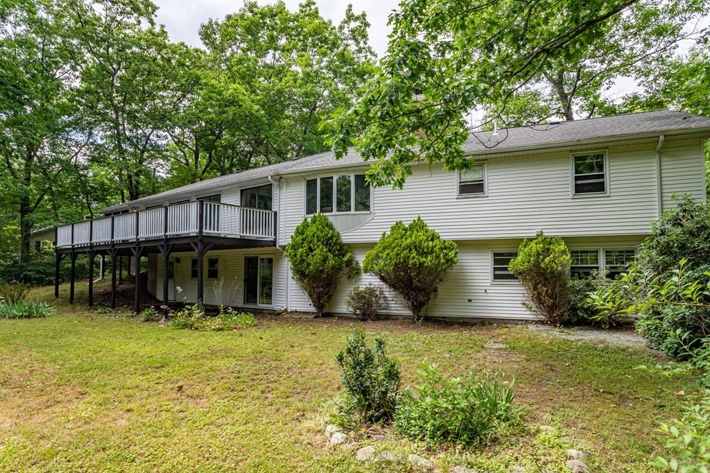 85 Kaleva Road Lancaster, MA 01523 - Photo 8 of 15 a view of a house with pool and a garden