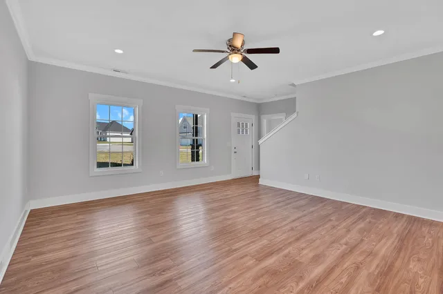 a spacious bathroom with a sink double vanity and a mirror