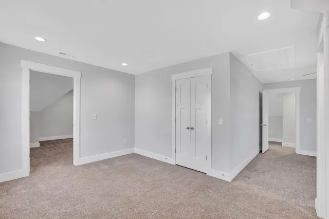 a view of a swimming pool with seating area