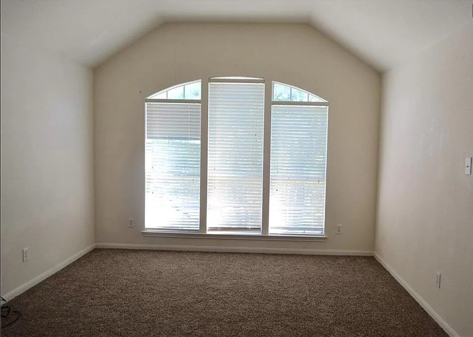 2210 Equestrian Trail Austin, TX 78727 - Photo 15 of 16 an empty room with a window