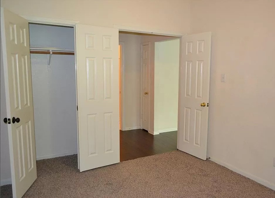 2210 Equestrian Trail Austin, TX 78727 - Photo 5 of 16 an empty room with closet