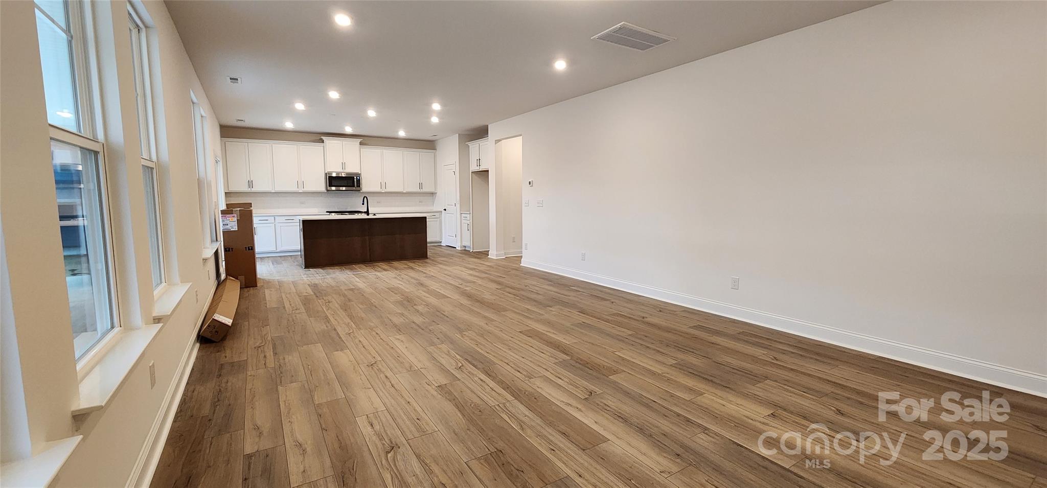 734 Sirius Lane York, SC 29745 - Photo 5 of 23 a view of kitchen with cabinets stainless steel appliances and window