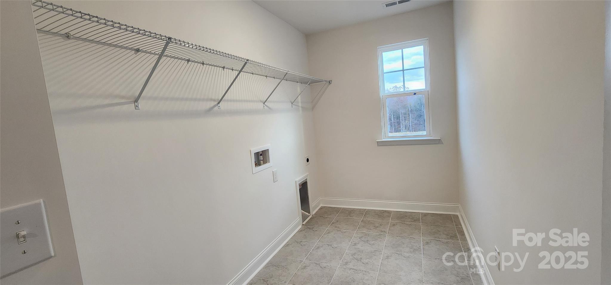 734 Sirius Lane York, SC 29745 - Photo 10 of 23 a view of a room with racks on the wall