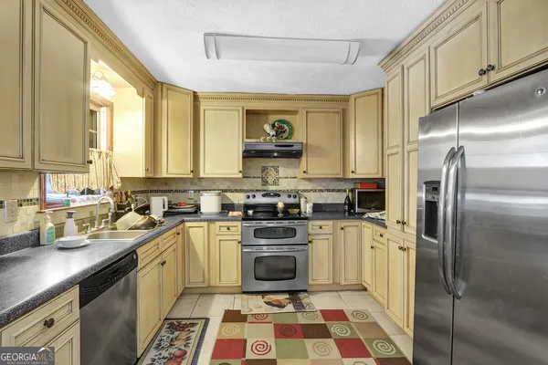 $340,000 | 869 Falconcrest Drive, Lawrenceville, GA 30043