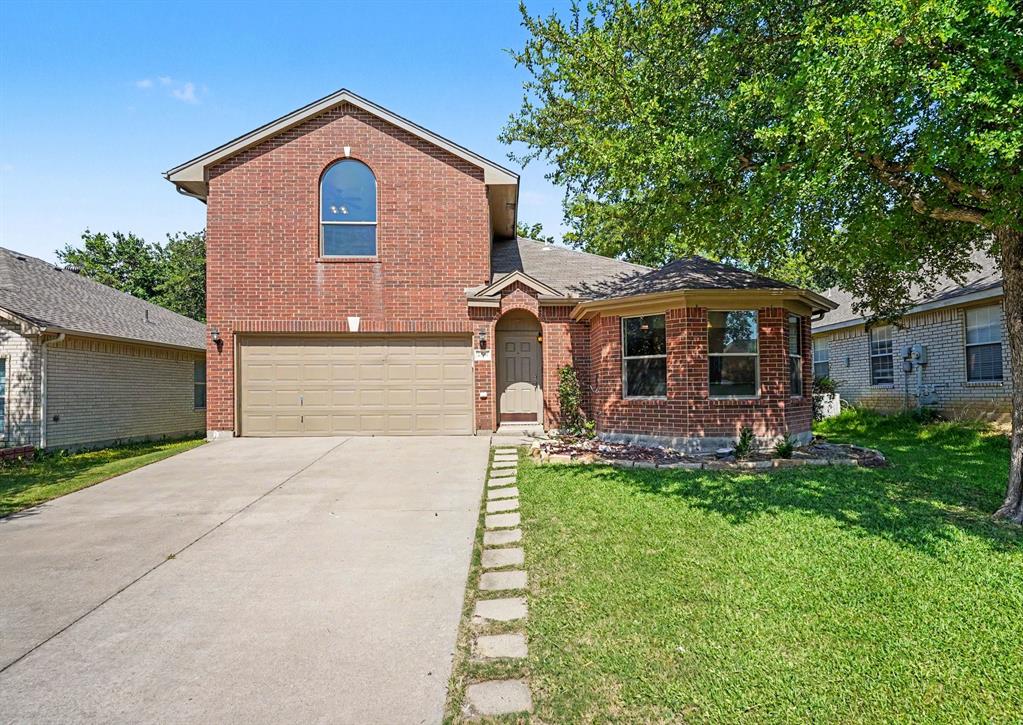 2541 Rivers Edge Drive Fort Worth, TX 76118 - Photo 1 of 31 a front view of a house with a yard