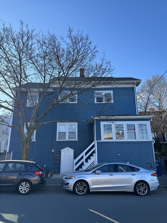 6 Proctor Street Salem, MA 01970 - Photo 17 of 26 a car parked in front of a house