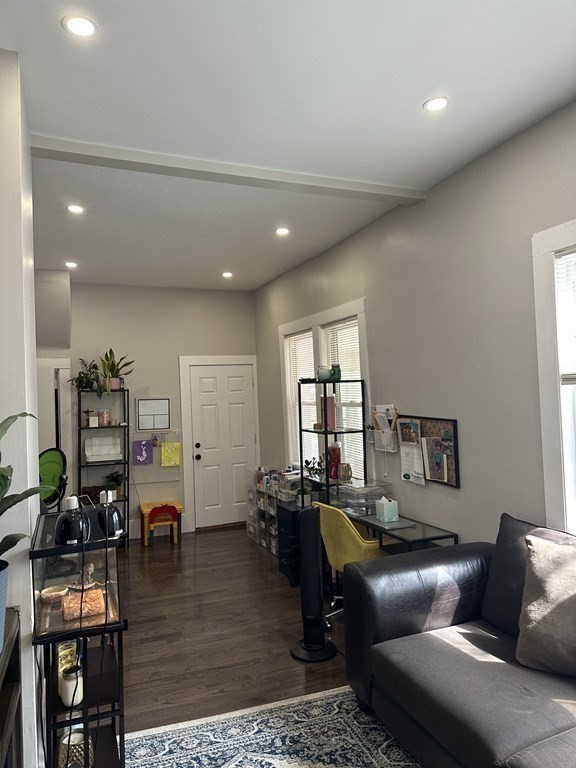 6 Proctor Street Salem, MA 01970 - Photo 4 of 26 a living room with furniture and a flat screen tv