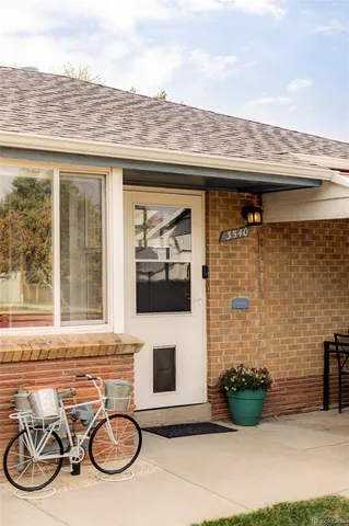 a view of a chair and table in the terrace