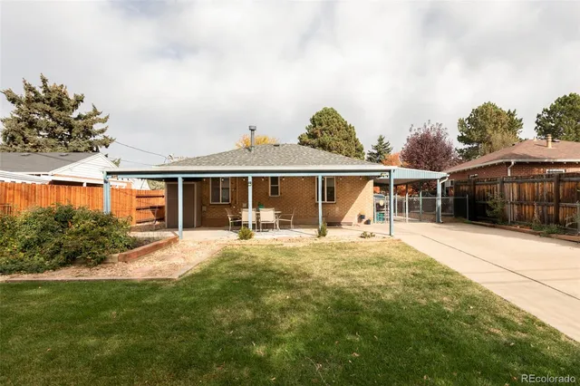 a front view of a house with a garden and porch