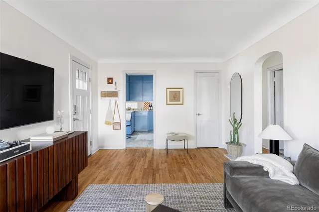 a bed room with a bed and a television