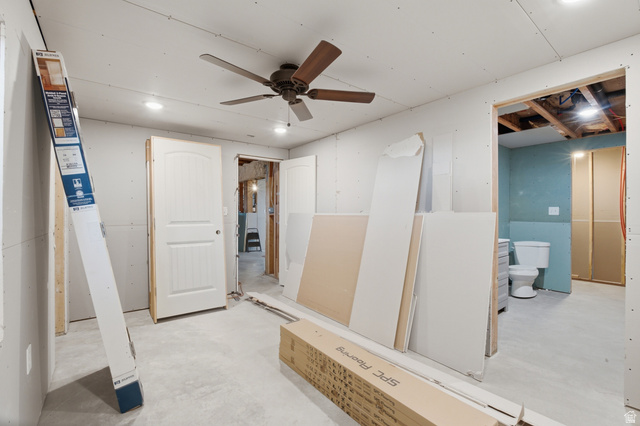 2567 West Rim Rock Drive Stockton, UT 84071 - Photo 41 of 64 Unfinished room featuring a ceiling fan with light, recessed lighting, and a white interior door